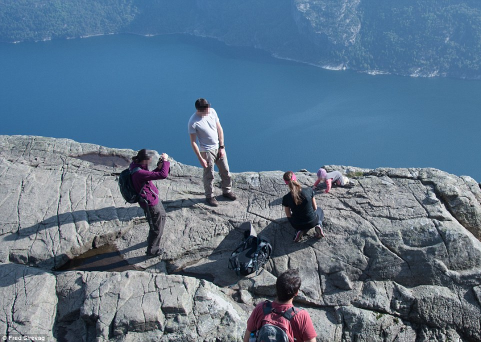 1410875403339_wps_56_Norway_baby_cliff_MUZZED_.jpg