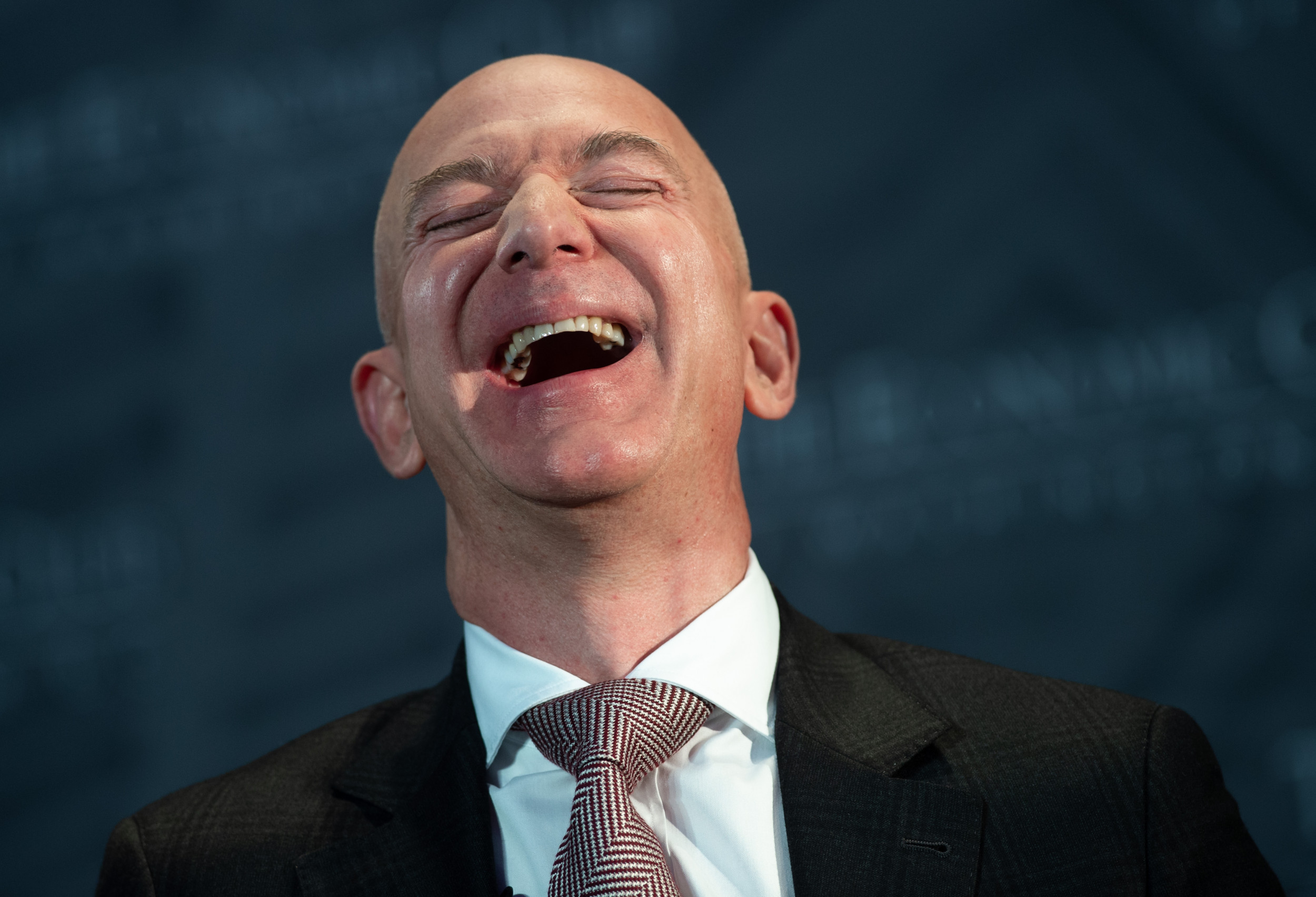 jeff-bezos-laughing-suit.jpg