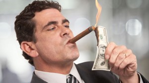 Rich-Businessman-Lighting-Cigar-With-100-Dollar-Bill-Shutterstock-300x168.jpg