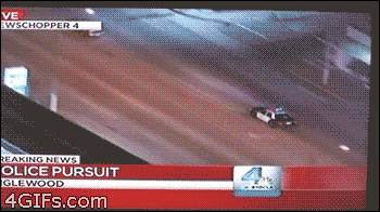 Police-chase-passes-house.gif