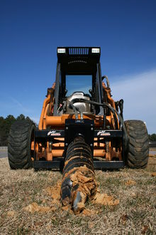 220px-2009-02-23_Skid_steer_with_extreme_duty_auger.jpg